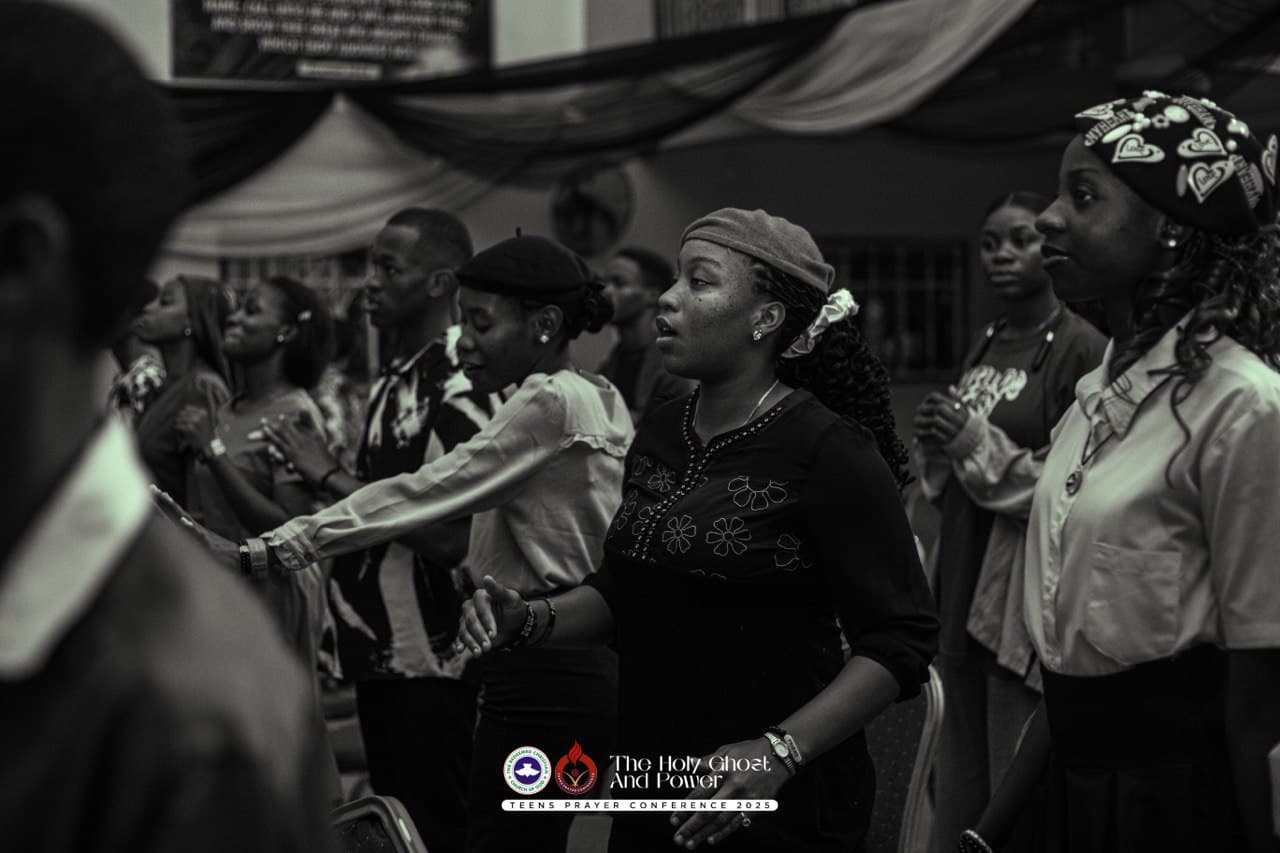 Teenagers praying at Teens Prayer Conference